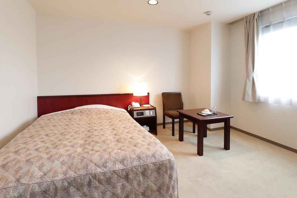Hotel Green Park Sendai Quarto foto